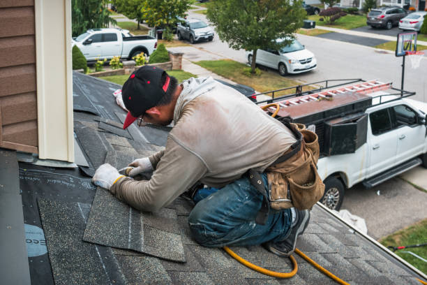 Professional Hail Damage Roof Repair technician working in Howard, PA